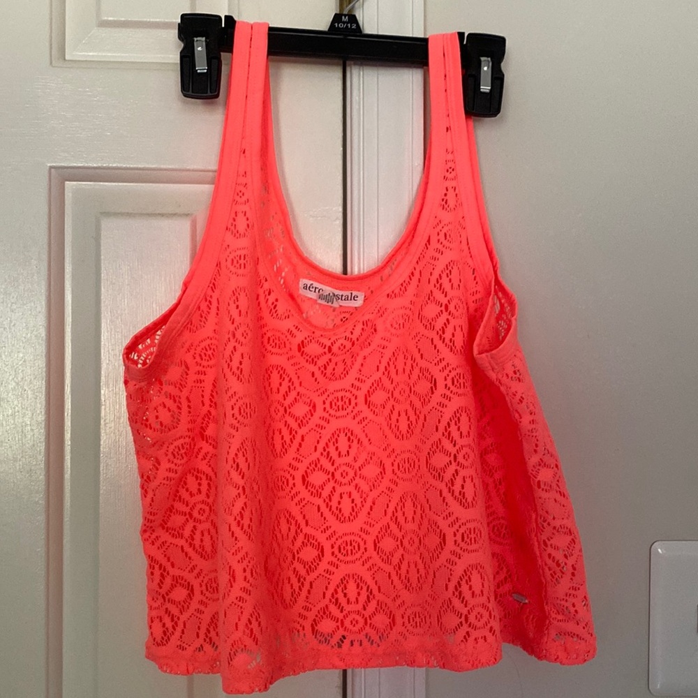 Summer tank in bright orange….see thru shell